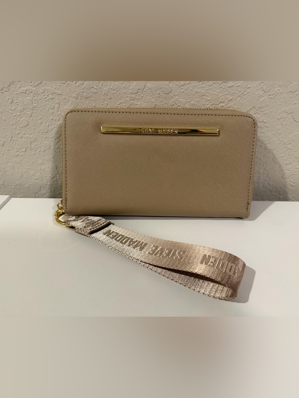 Steve Madden Beige Wristlet with Branded Strap and Gold Accent